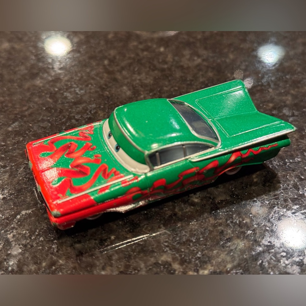 Disney Pixar Cars Holiday Cruiser Ramone Diecast Metal 1:55 Christmas Red Ribbon